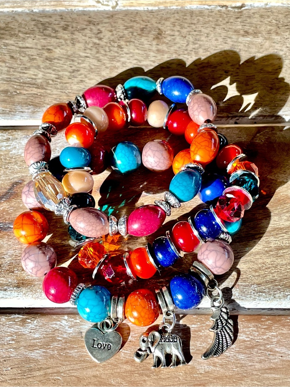 Handmade Colorful Beaded Stretch Bracelet. Love, Elephant & Angel Wing Charms